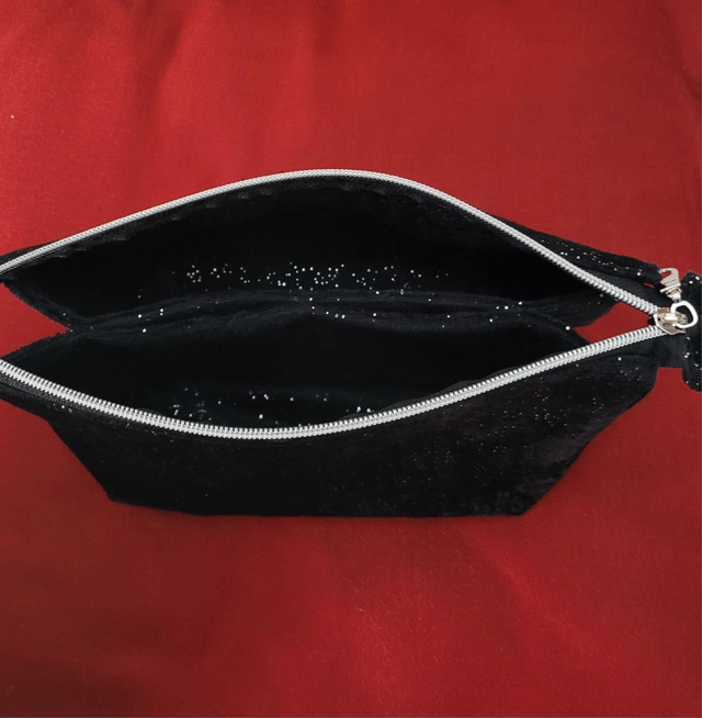 Trousse de toilette noire à paillettes