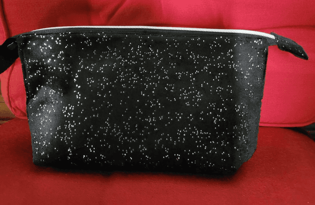 Trousse de toilette noire à paillettes